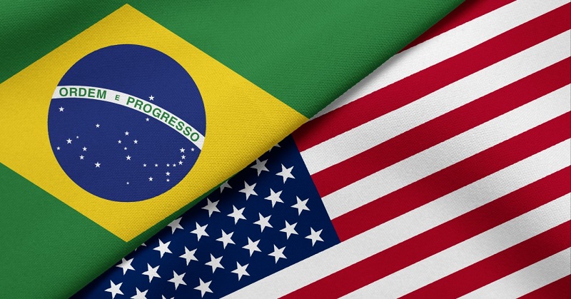 Ilustração de duas mãos apertando um acordo de negócios, simbolizando as negociações entre Brasil e EUA
