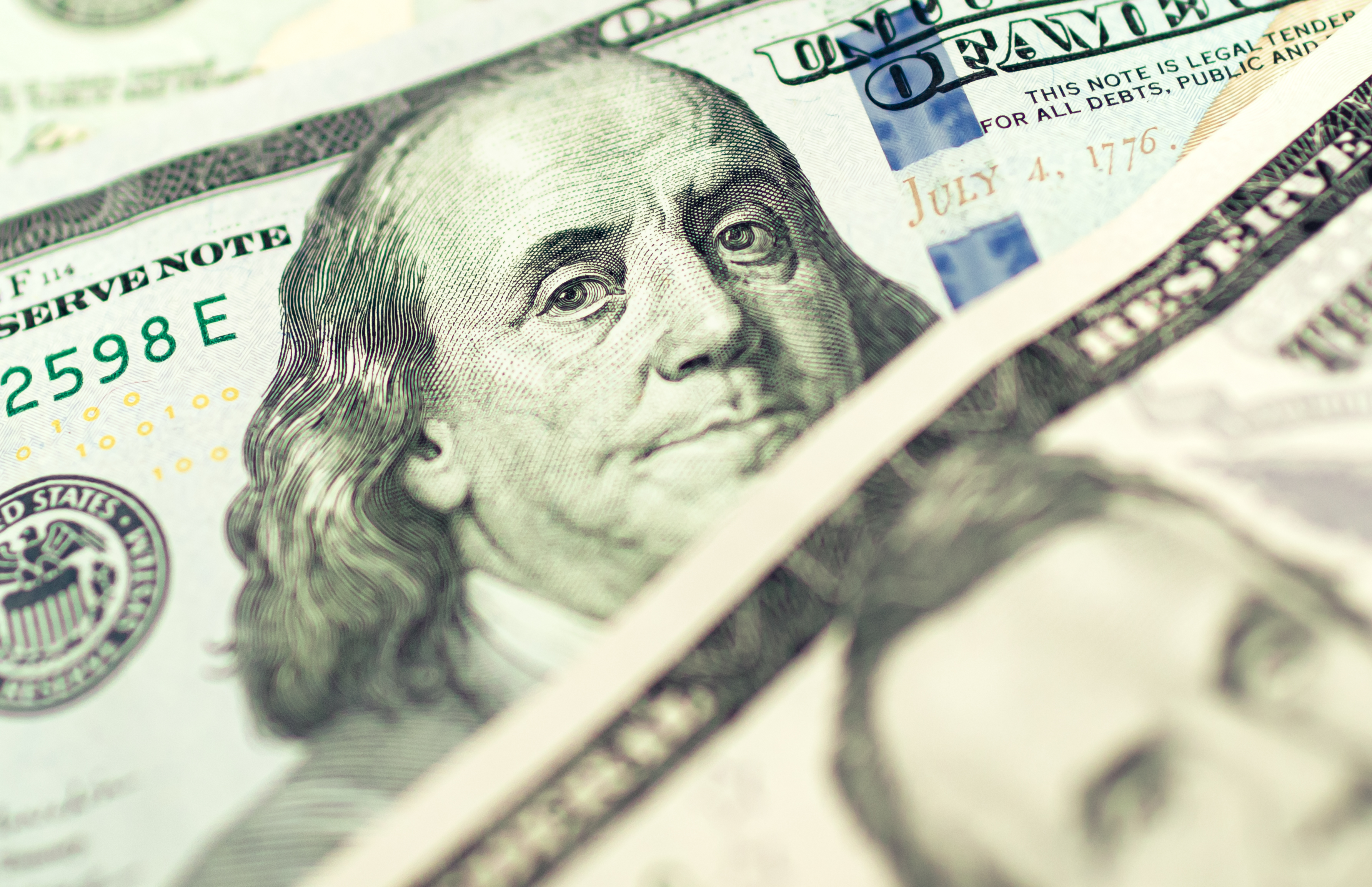 Notas de dólar americano a representar o mercado financeiro